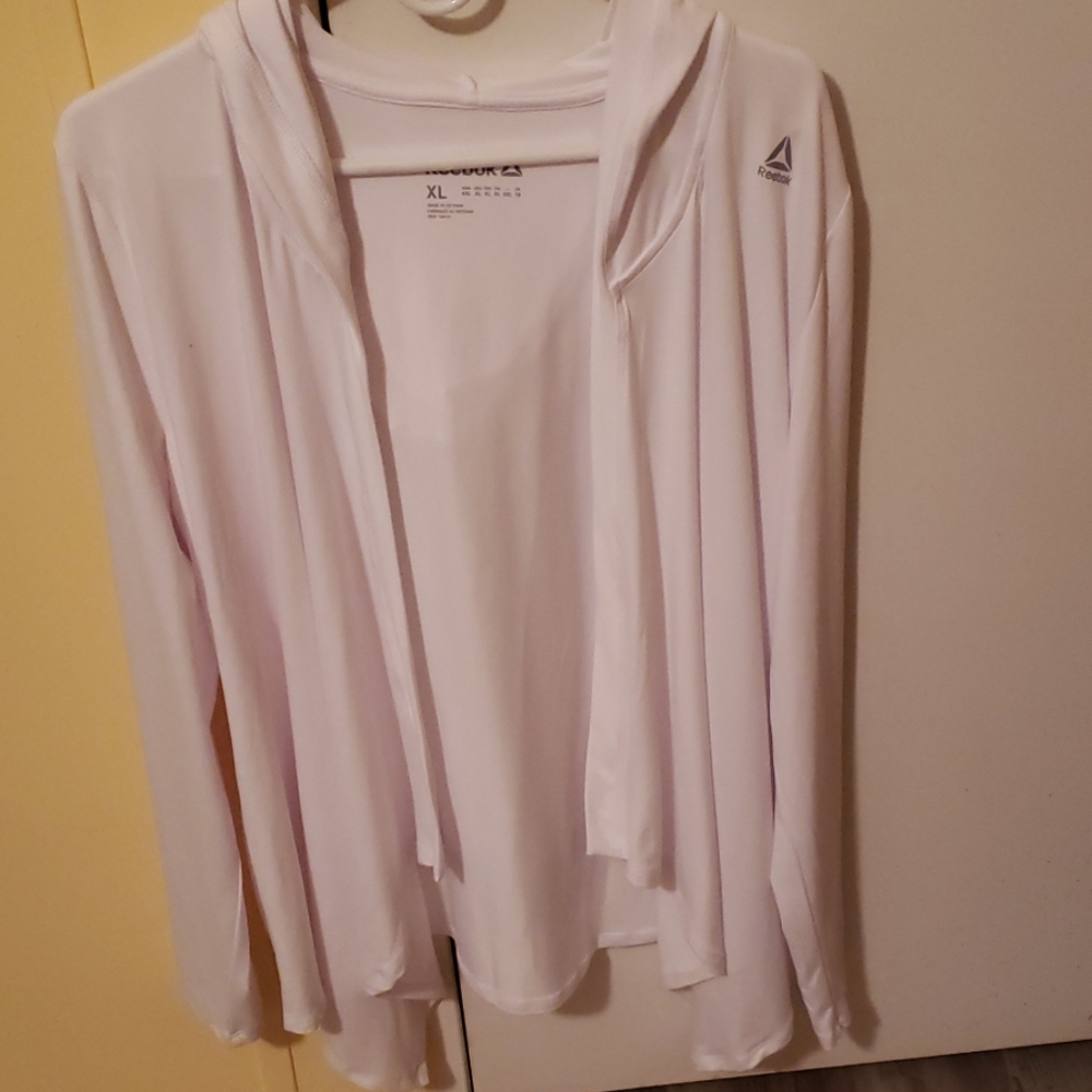 White Reebok , light sweater